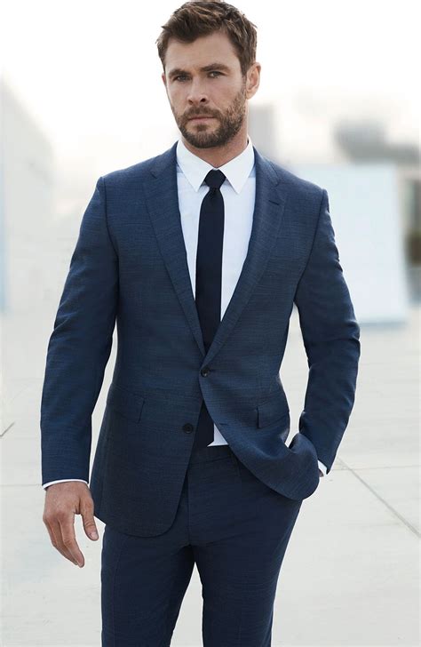 navy suit black tie.